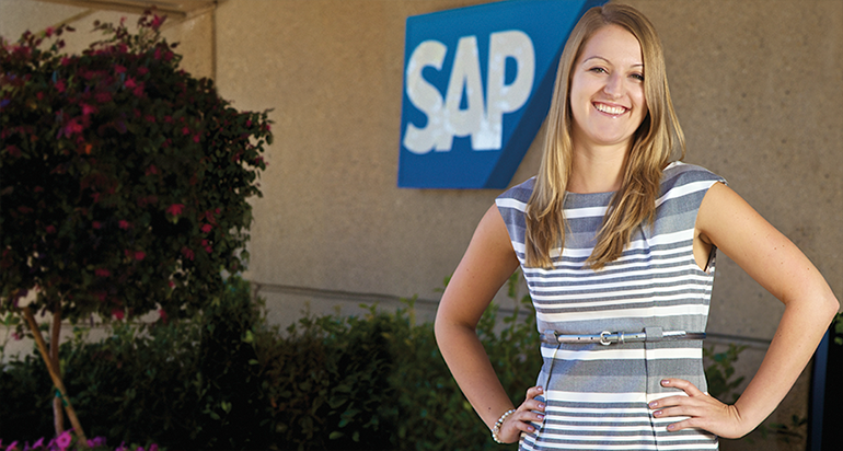woman standing in front of SAP building