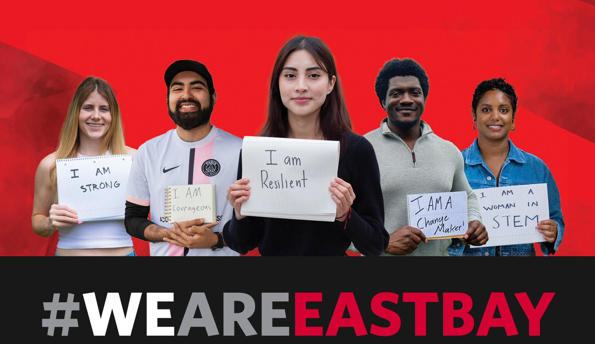 Students holding up #WeAreEastBay signs