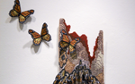Needlepoint of Monarch butterflies.