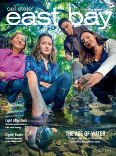 Fall 2016 cover of professor and students working on water project
