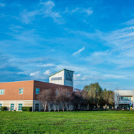 The campuses' green landscape and buildings. 