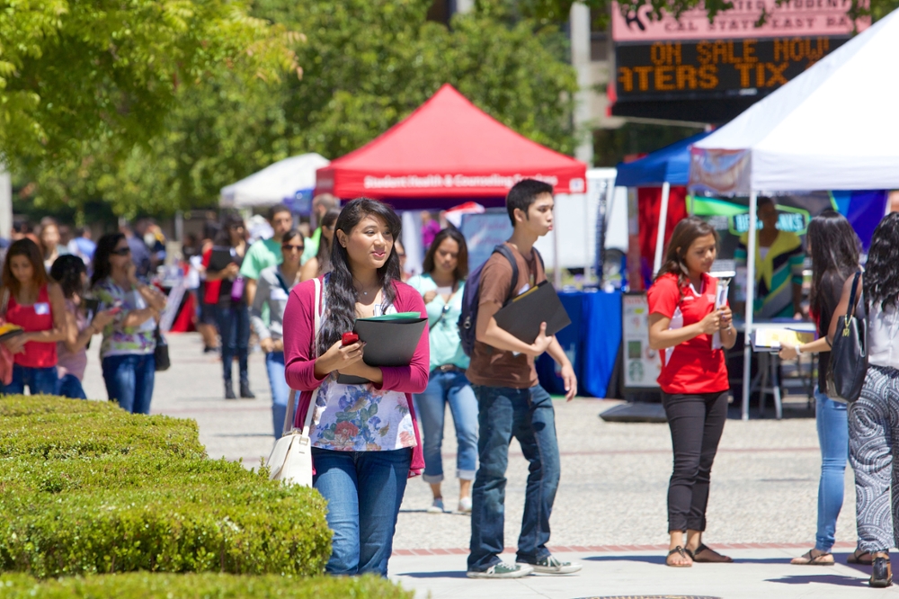 Students walk on busy campus
