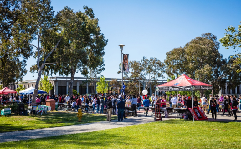 Students are walking around the campus event