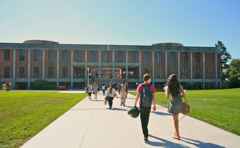 Students are walking toward a school building