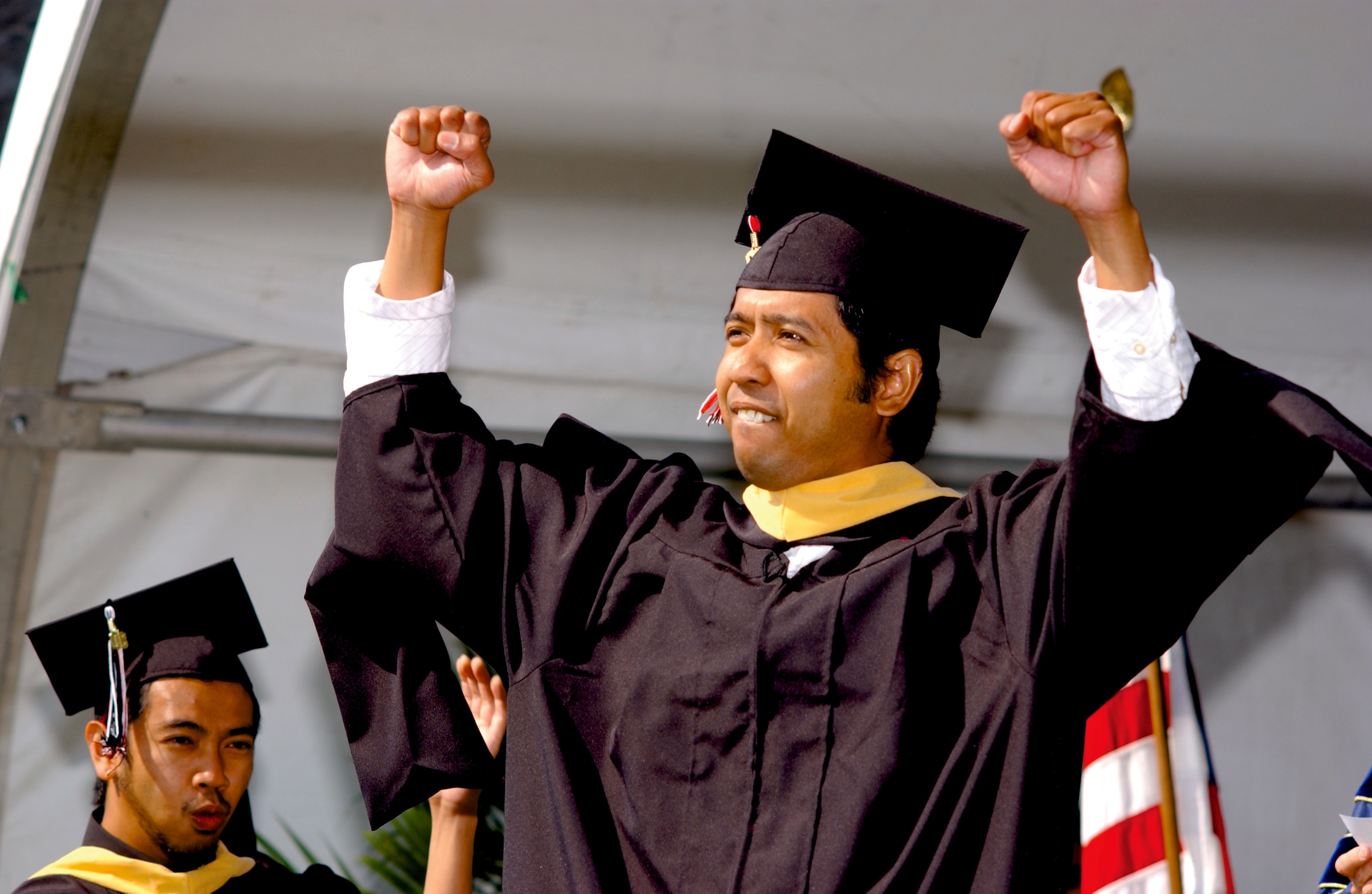  Link to Course Accessibility Tips Graduate at Commencement | Picture of Student at Commencement