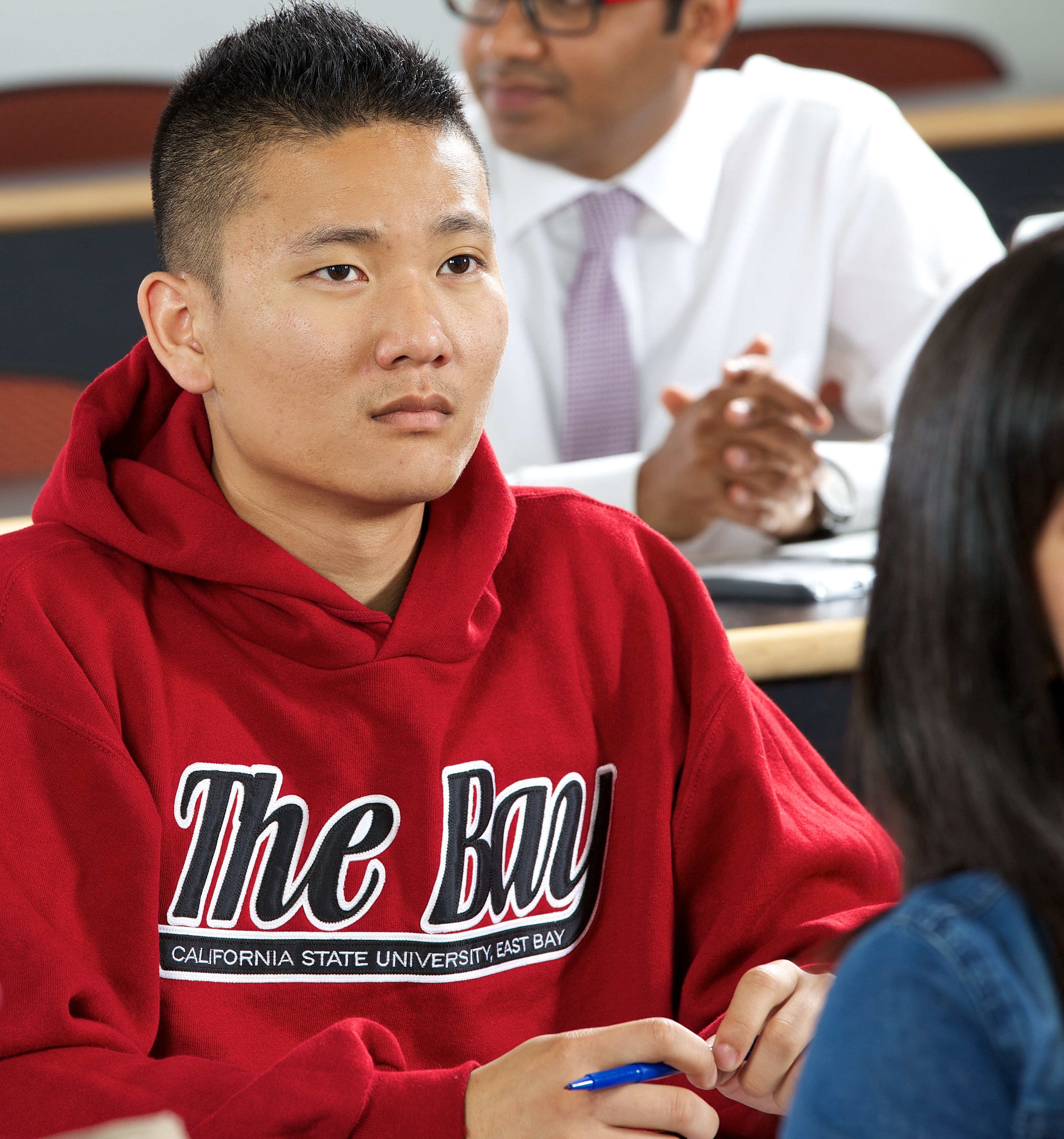 Student Listening to Lecture in a Classroom