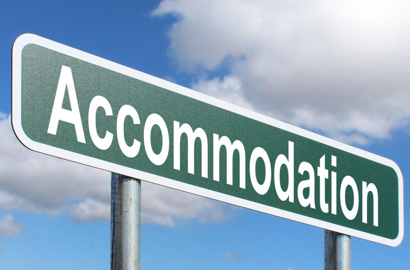 Street sign labeled Accommodation