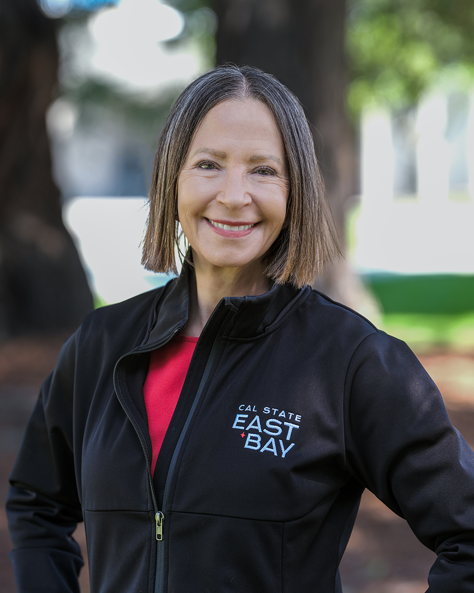 President Sandeen at the Redwood Grove on campus