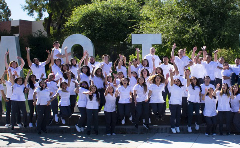 Nursing Students Jumping for Joy