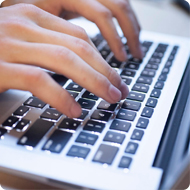 image of person typing on computer