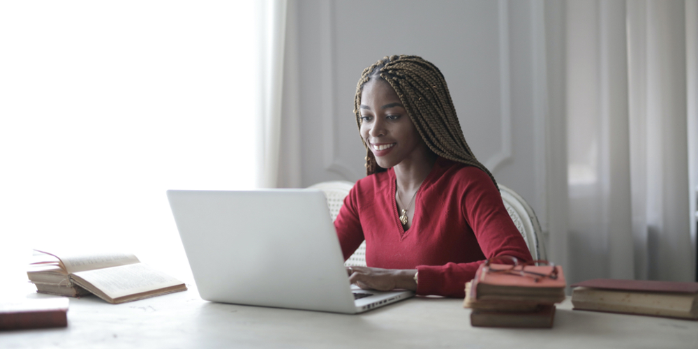 woman looking at computer screen