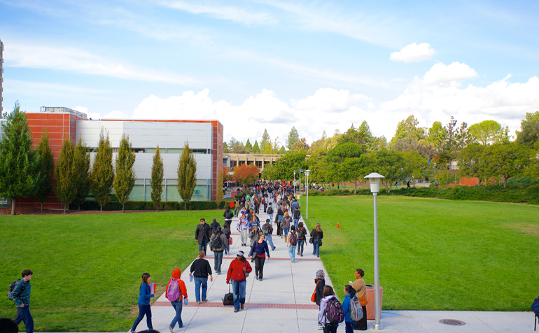 Students Walking Across Campus