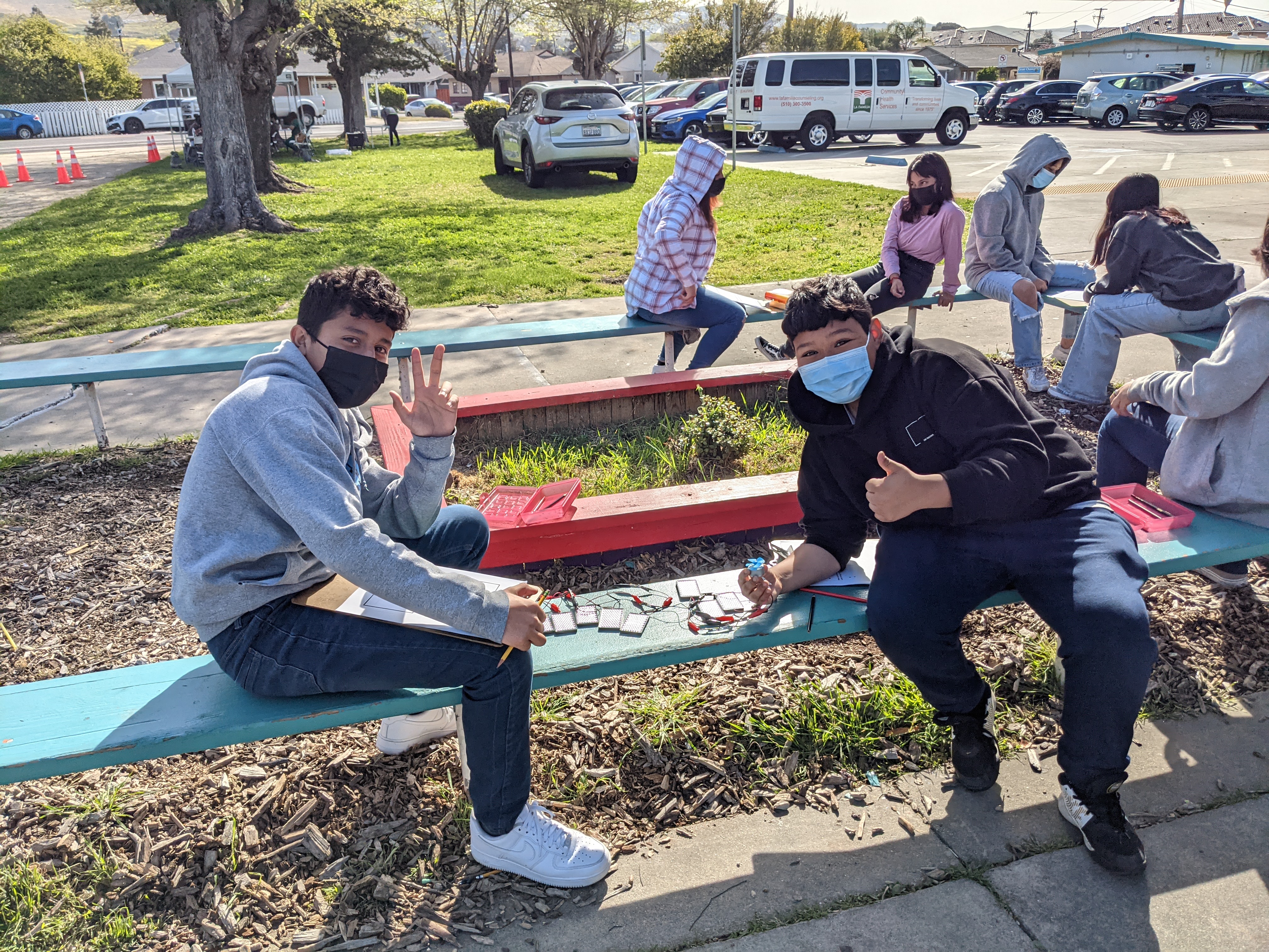 Students wiring circuits.