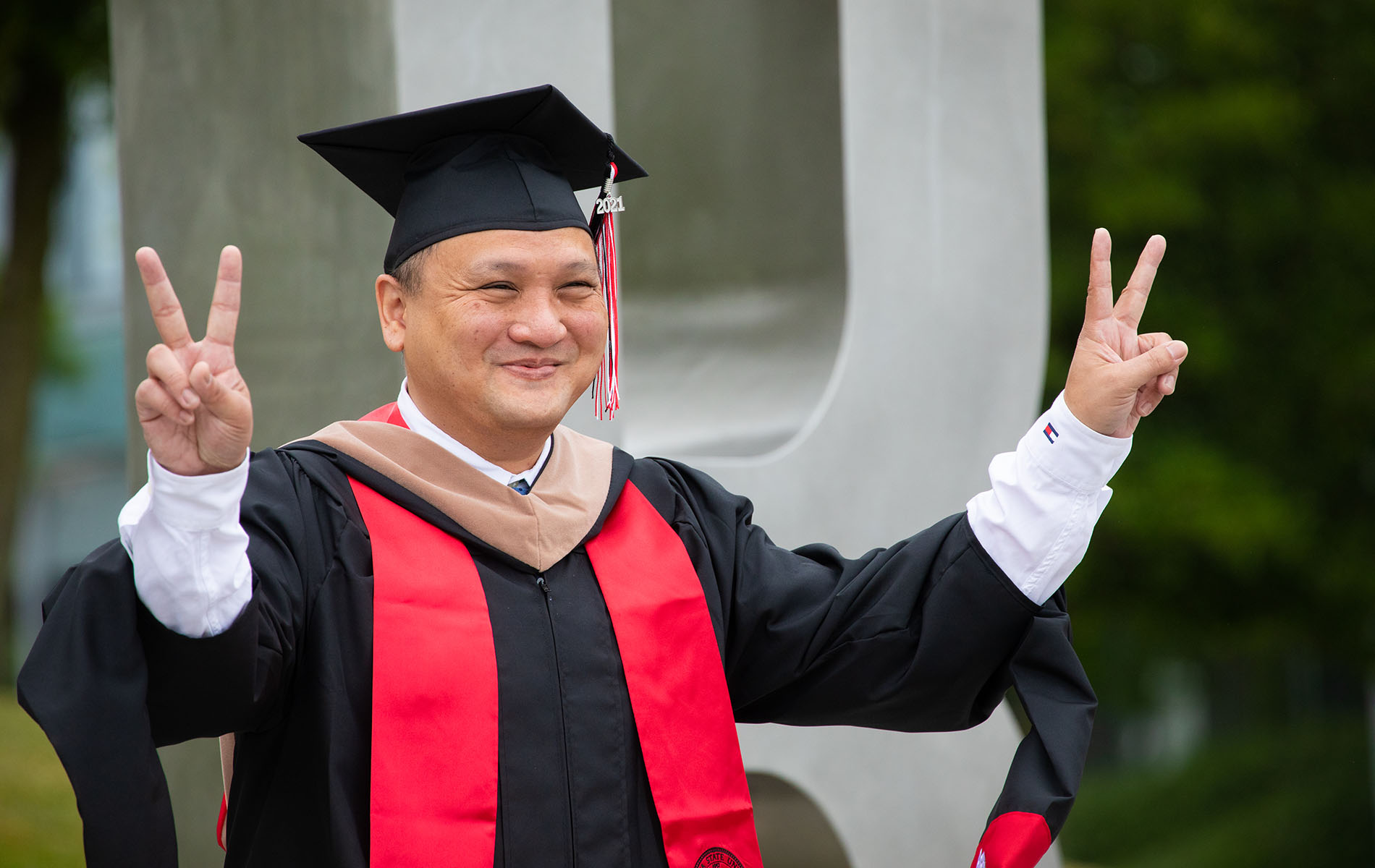 Graduate in cap and gown