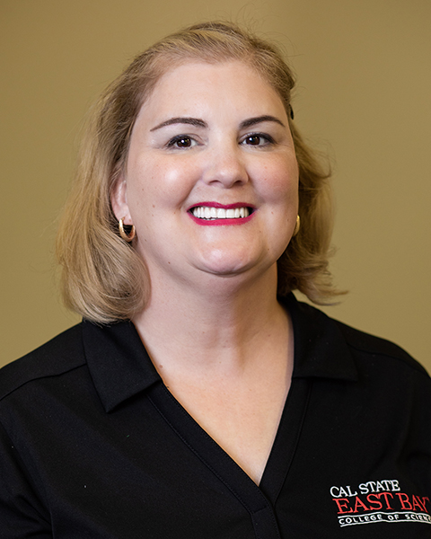 Our Administrative Assistant smilling.