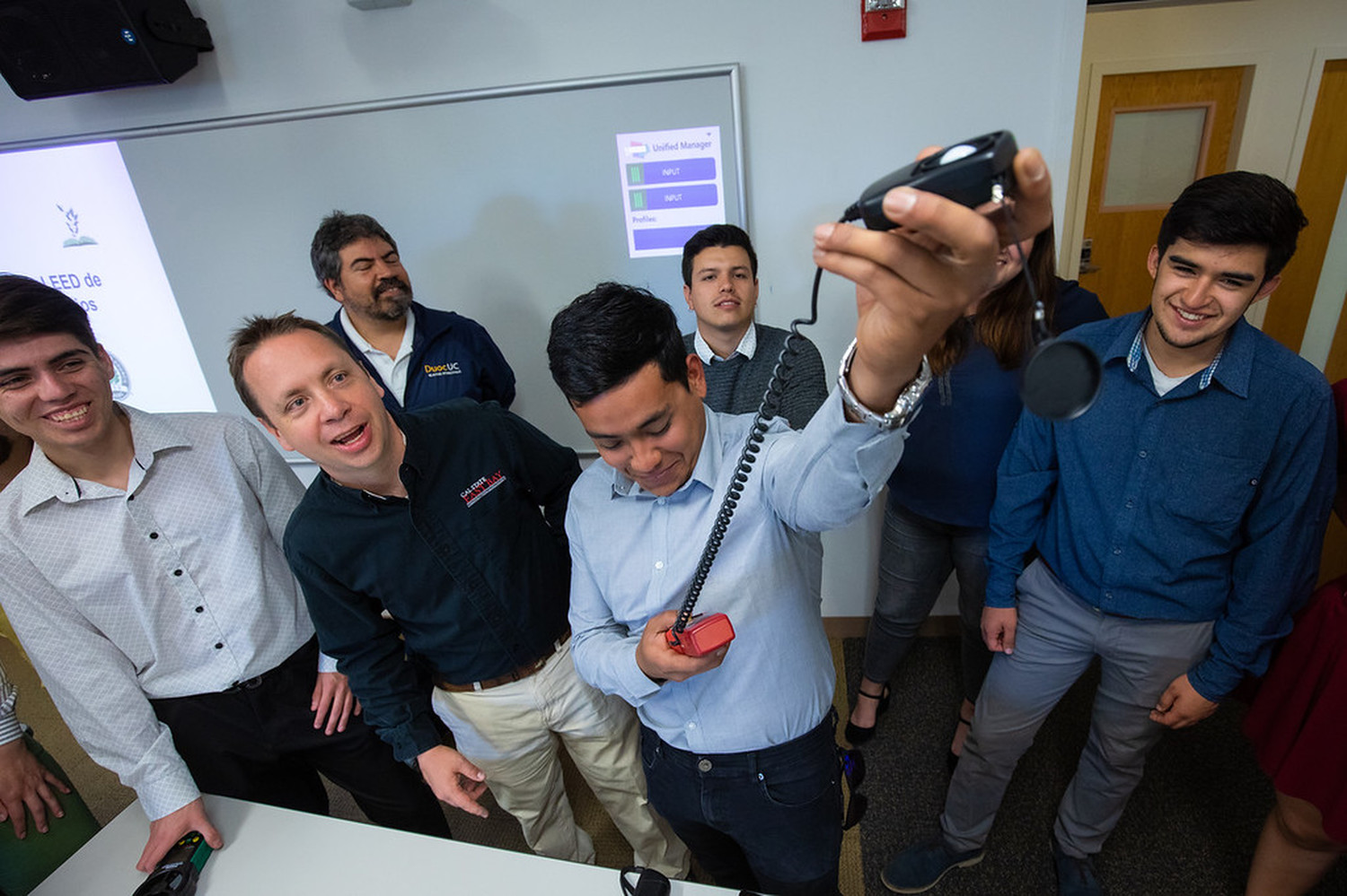 Cristian Gaedicke, associate professor of engineering and students from Chile 