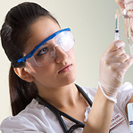 Women preparing syringe 