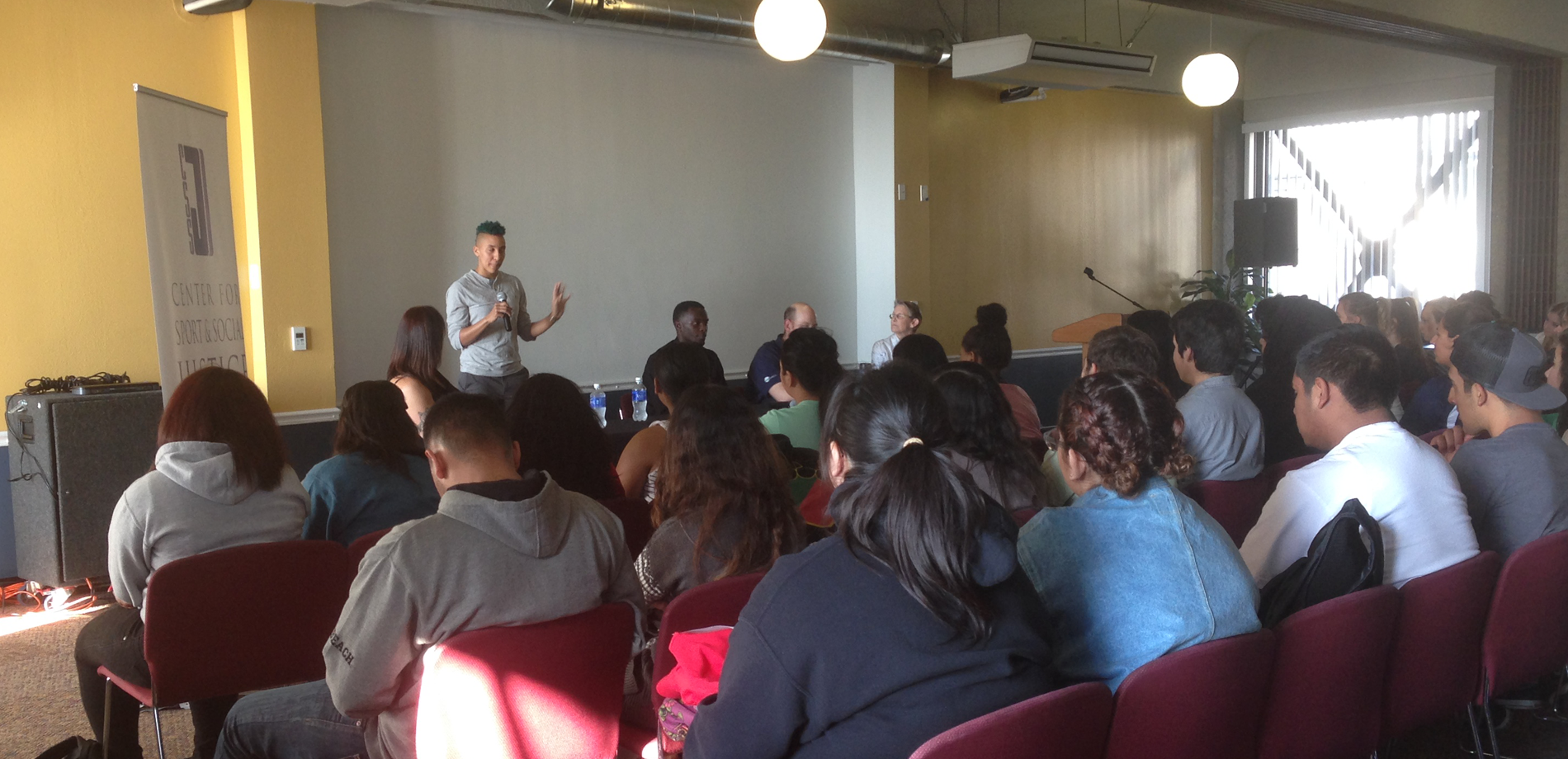 person speaking to audience