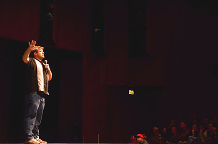 audience watching a speaker