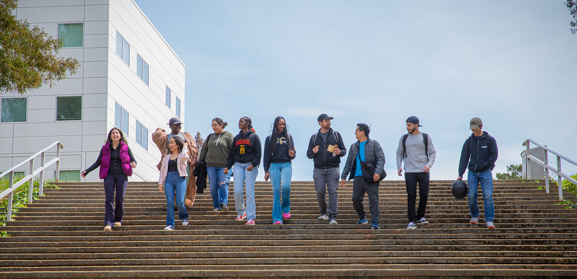 Cal State East Bay students walking down steps