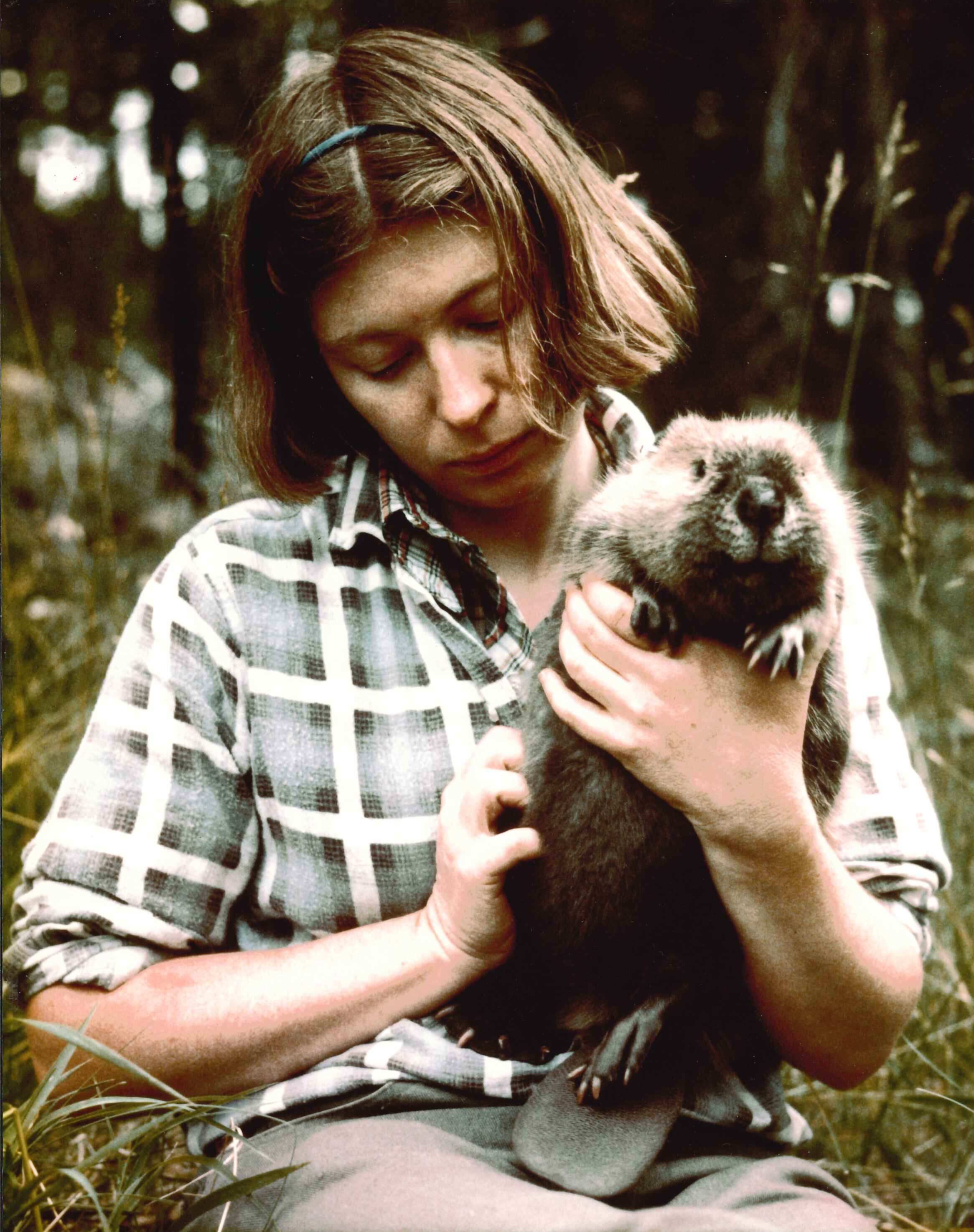 Ellen Woodard photo with animal (Beaver) from her research