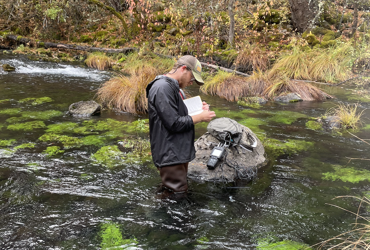 EESC Student conducting field work in a California stream