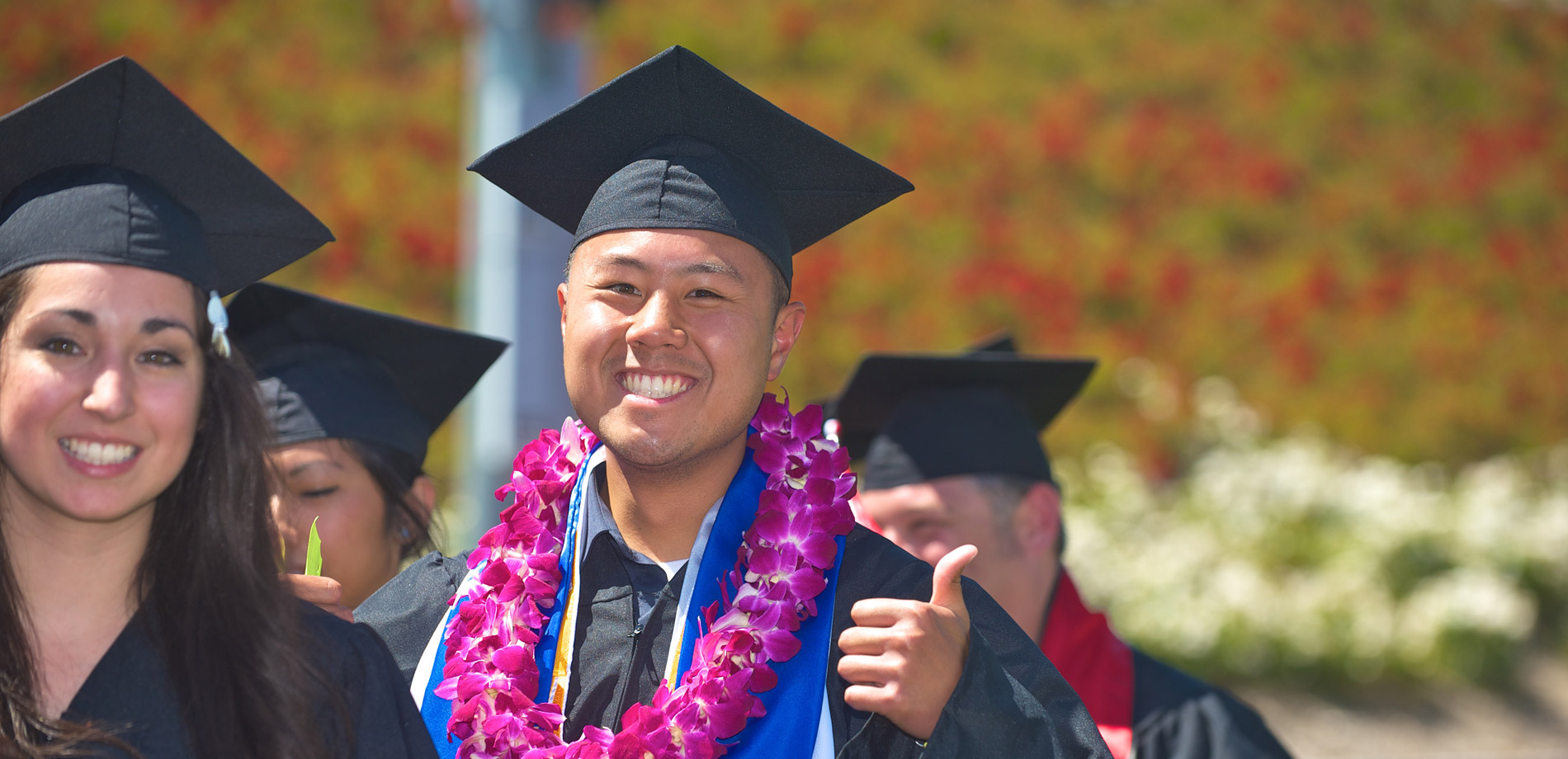 Student Grinning at Graduation