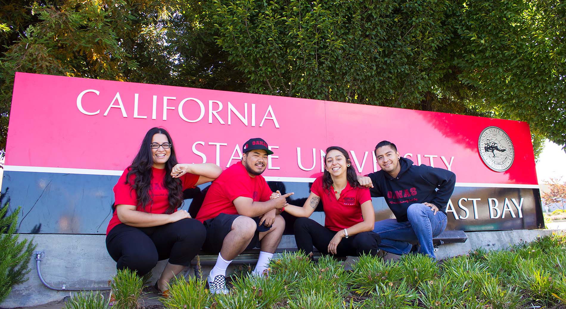 GANAS studenets at East Bay sign