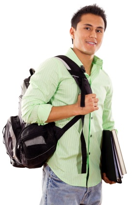 Hispanic young man with books