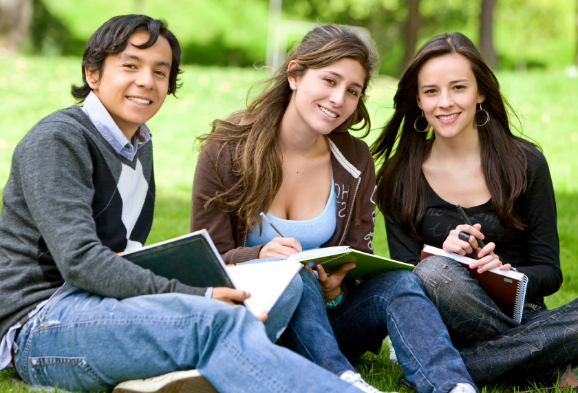 three students studying