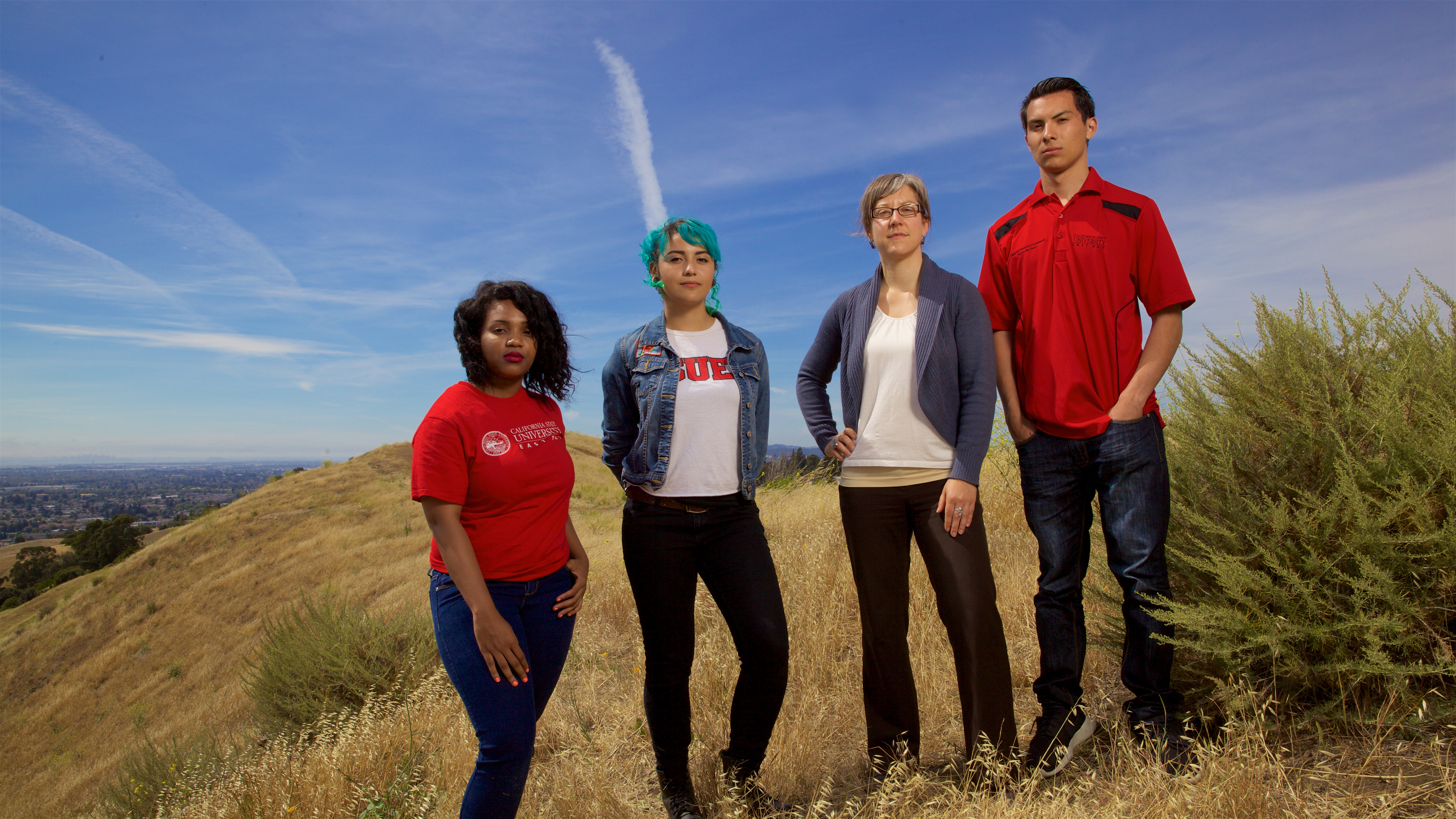 Students standing on a university hilltop