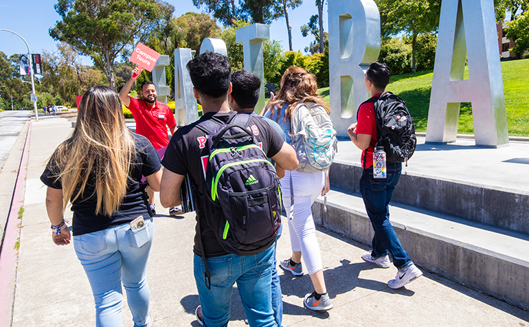 Students being led around by a tour guide