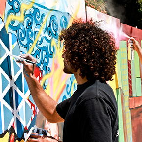 person painting mural 
