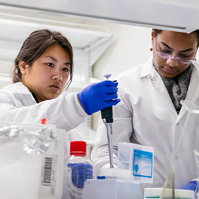 two people in lab coats 