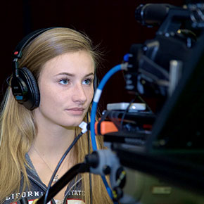 student with media equipment 