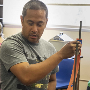 man standing in class 