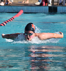 Swimmer does butterfly