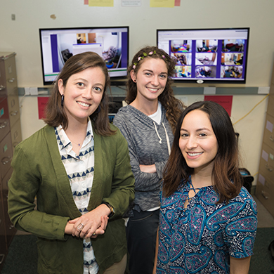  Three young women pose in an old office