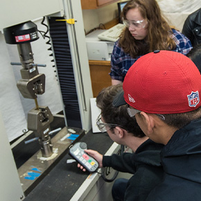 students practicing physics in class 