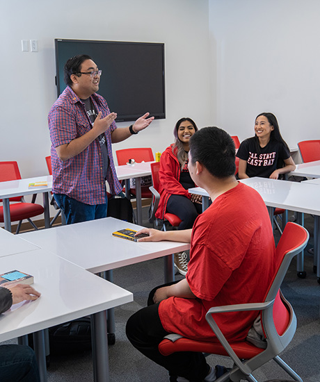 Students in a classroom watching a presentation