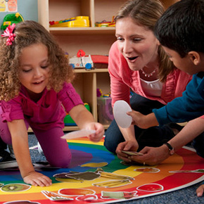 female playing with kids 