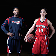 Male soccer player and female basketball player posed for picture