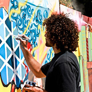 Student paints a mural