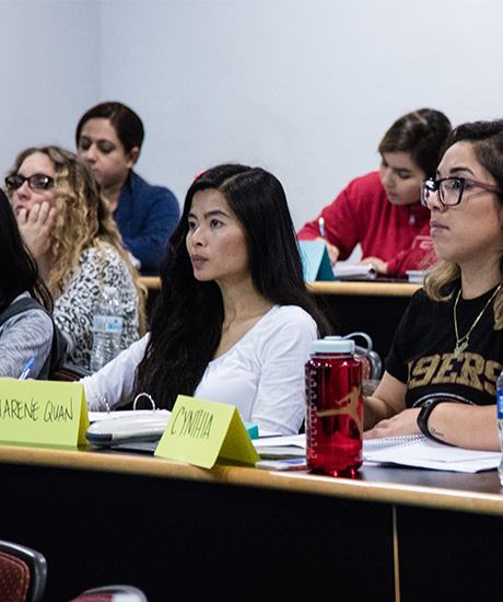 Women in Leadership students sitting in a classroom during a lecture