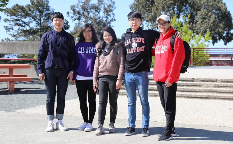 students hanging out on campus