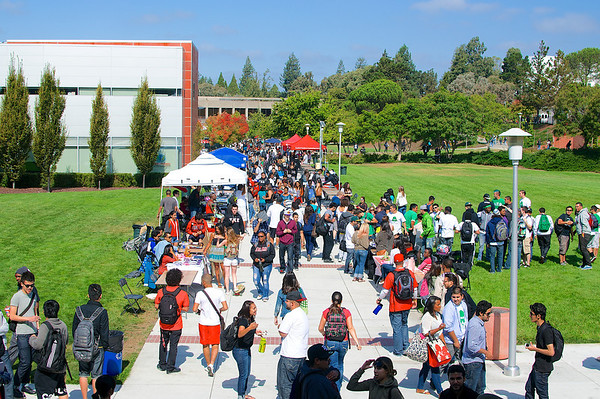 Large group of students at fair outside University Union