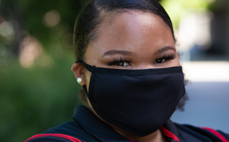 Female student wearing black mask