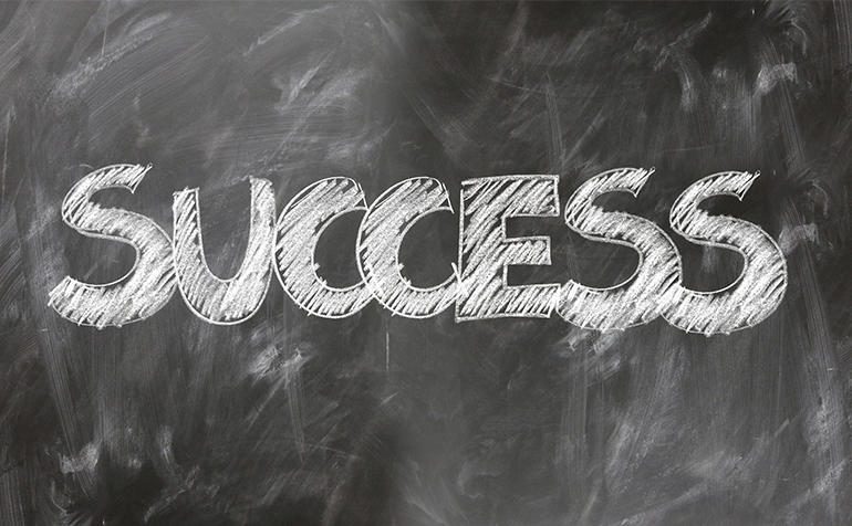 success written on chalk board