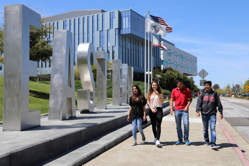 International Students by the East Bay monument letters