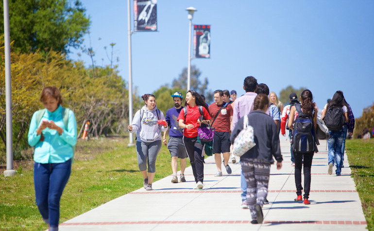 students walking across campus